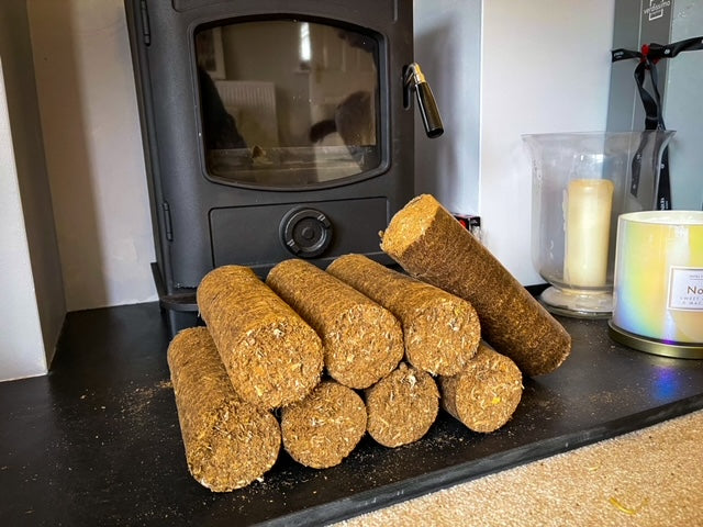 Long Burn Nestro Natural Wood Fuel Briquettes in front of fireplace